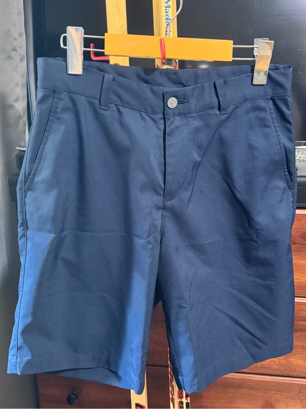 3 pairs of Boys golf shorts! 2 black & 1 navy! 2 puma 1 under armour!